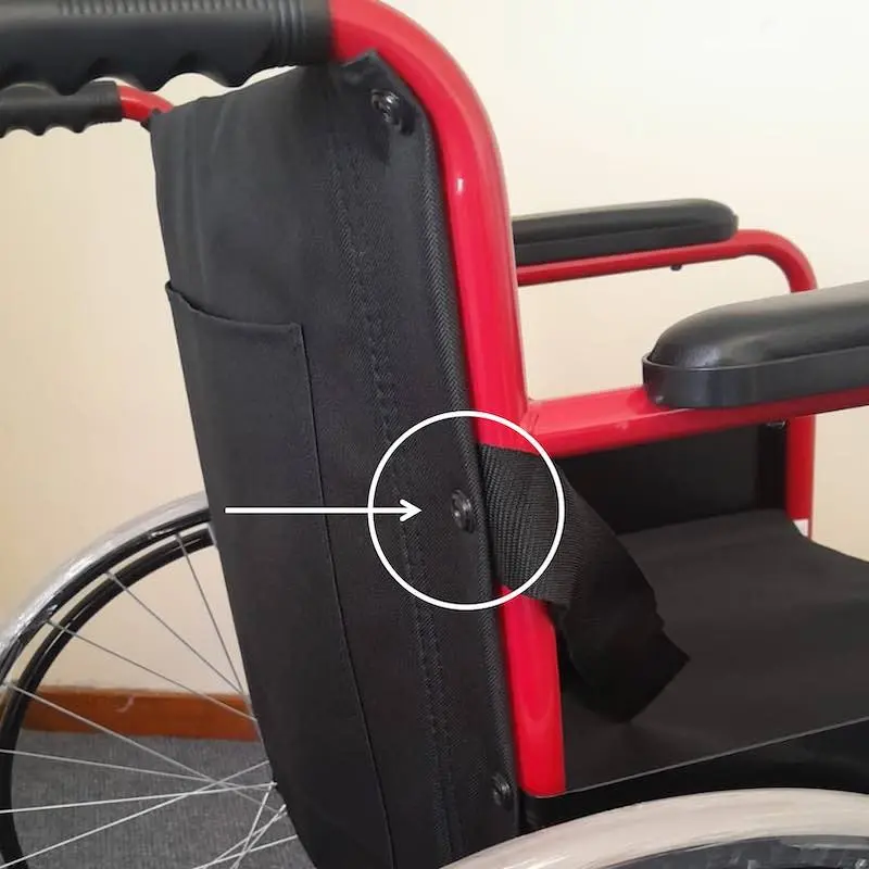 Wheelchair Safety Restraint Belt 4 Close-up of wheelchair restraint belt screw-fit attachment point on wheelchair backrest